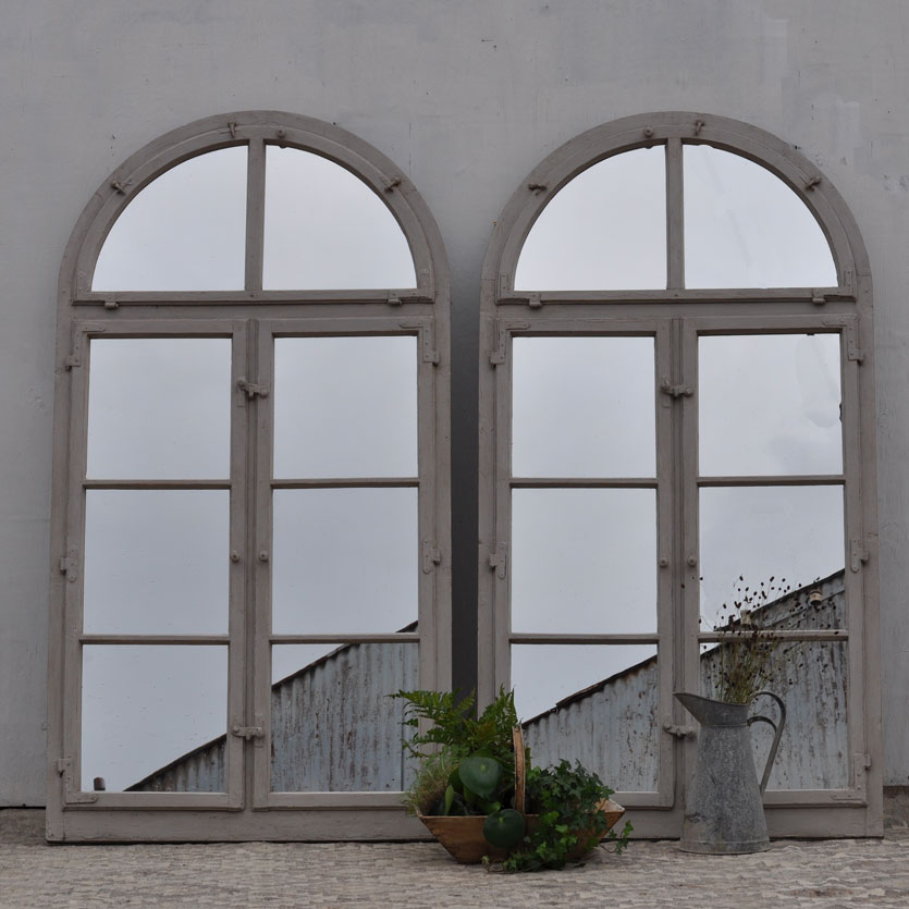 pair of arched architectural window mirrors