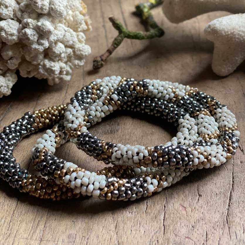 Ethnic set of three beaded bracelets | White