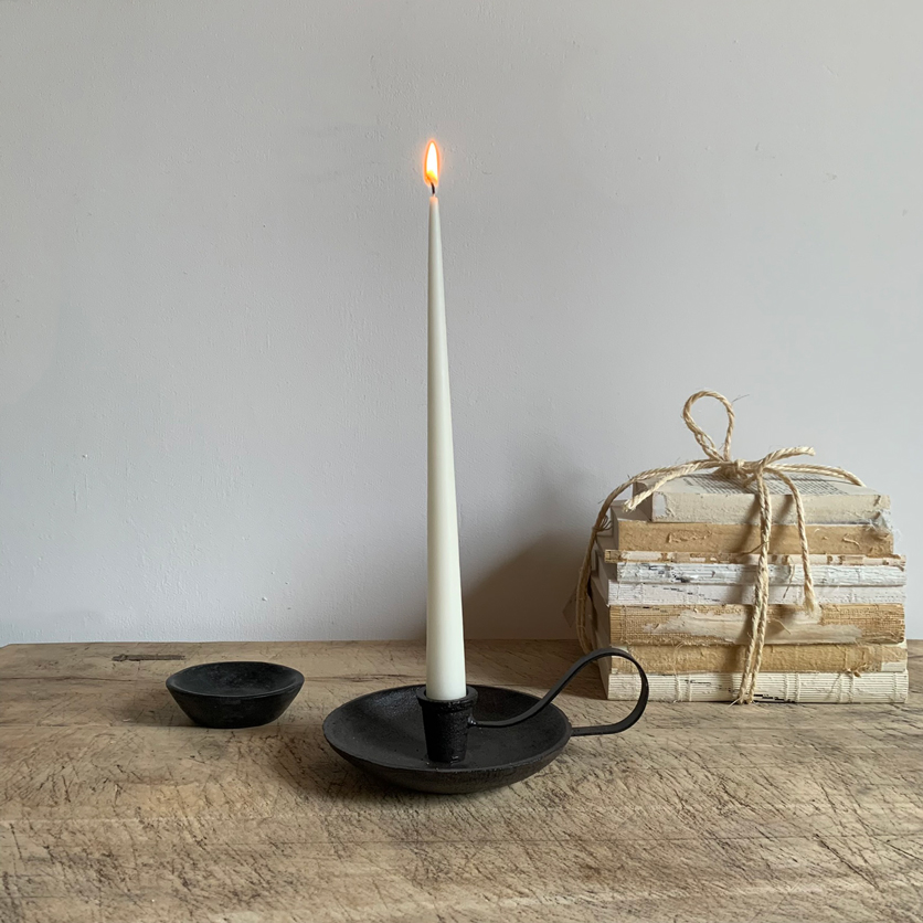 Cast iron candlestick holder with handle