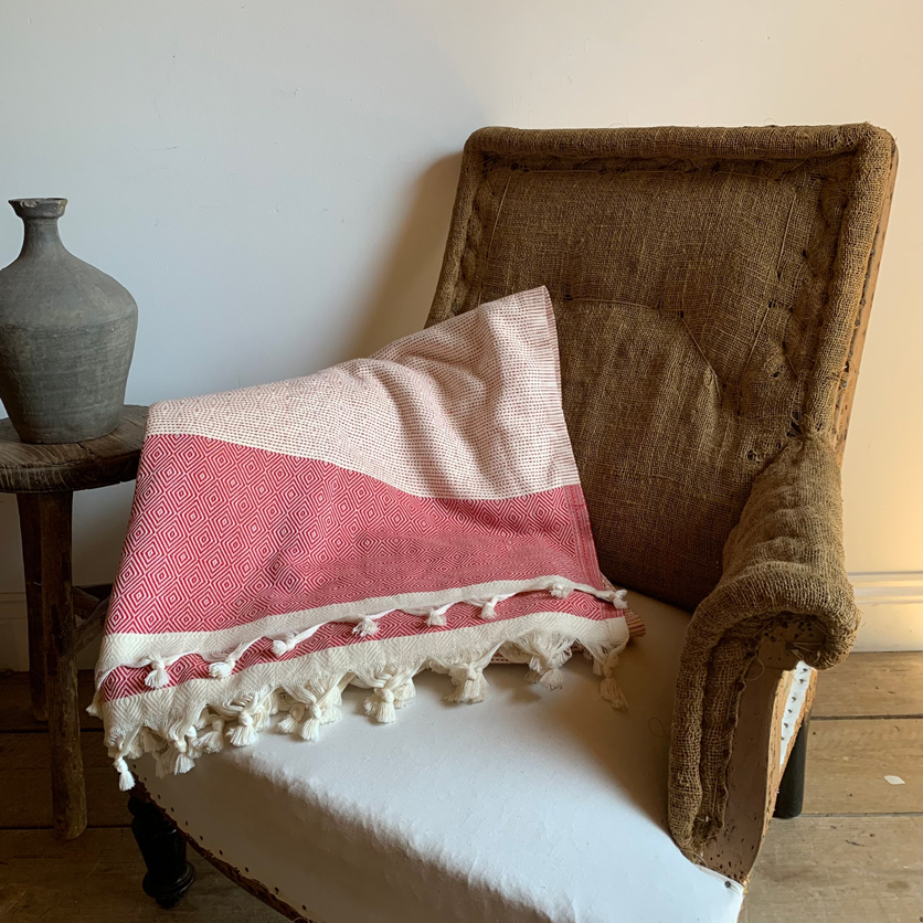 Soft pink woven cotton throwSoft pink woven cotton throw