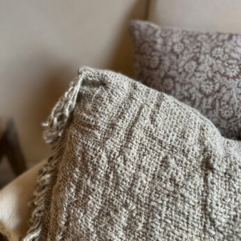 Natural woven tie back cushion