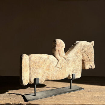 Hand carved stone primitive horse