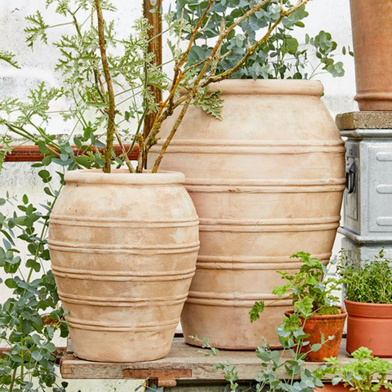 Large ridged terracotta urn
