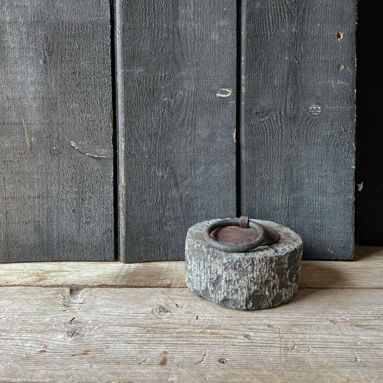 Stone weight door stopper