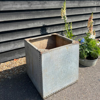 Vintage water tank planter | A