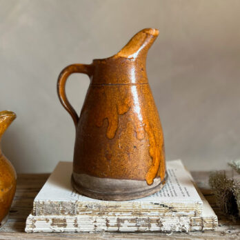 Pair antique glazed cider jugs