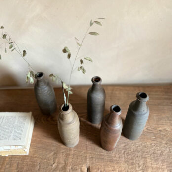 Small unglazed antique cider bottle