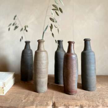 Small unglazed antique cider bottle