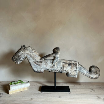 Large wooden horse and rider