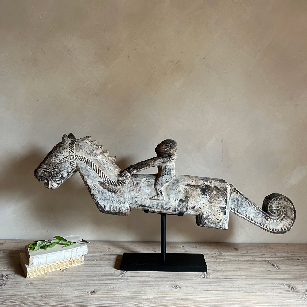 Large wooden horse and rider